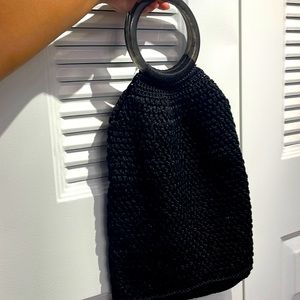 NWT. Binge black handcrafted wristlet!